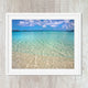 stunning landscape with bright blue tropical water, sand, textured waves, horizon and clouds, available in canvas and prints